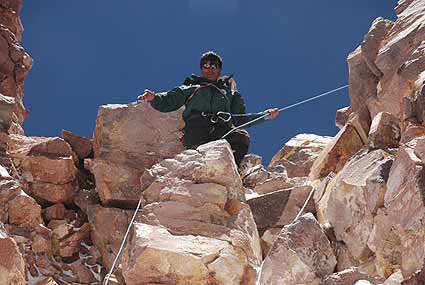 Juancho fixes lines near the summit of Ojos del Salado