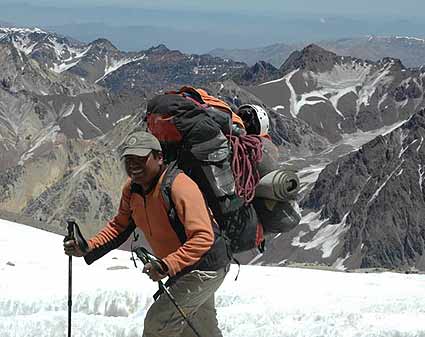 Oswaldo carries a big load higher on AconcaguaOswaldo carries a big load higher on Aconcagua