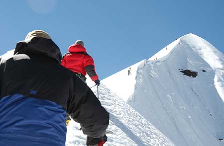 The Berg Adventures Team climbs along the stunning ridge of