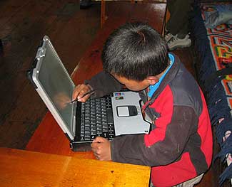 Lhakpa working alone on the Toughbook