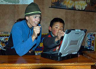 Lhakpa working with Shelley on the Toughbook computer 