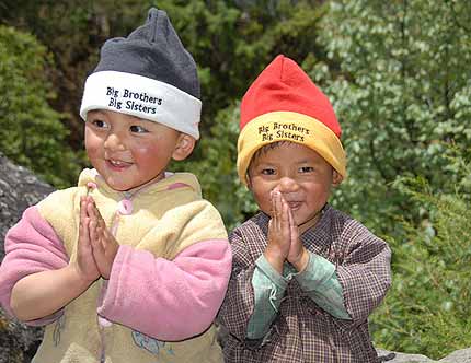 Two wonderful Nepalese children wear their new Big Brothers Big Sisters hats