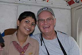 Roger sat with the flight attendant on their way to Lukla