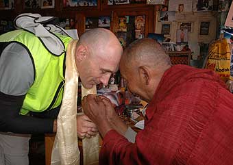 Opus receives a blessing from the Lama Geshi