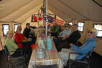 Trekkers making themselves at home in the Base Camp dining tent