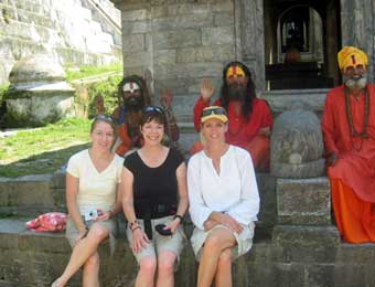Maria, Cami and Karen with holy men at Pashupati