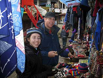 Matt and Libby buying something for Mom