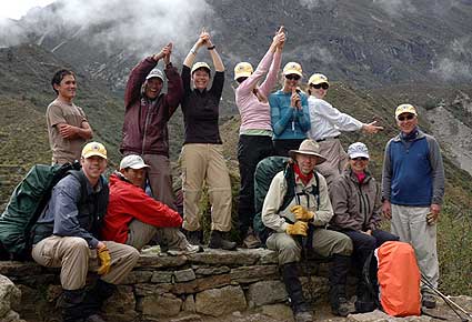 The trekkers take a short rest, some look like they are posing for a Charlie’s Angels poster