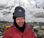 Darren makes it to Base camp wearing his Yankee hat