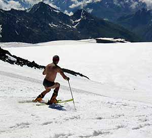 A Russian skier works on his tan during his descent on Elbrus