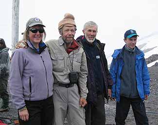 Karen socializes with our Russian guides Yury, Alex and Alexxs son Felix