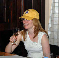 Stacey with her new BAI hat at the welcome dinner at Nevsky Palace