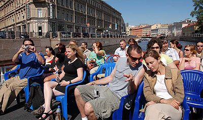 Enjoying a boat ride along the canals of St. Petersburg