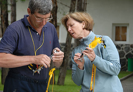 Rosemary gets some tips on how to adjust her crampons