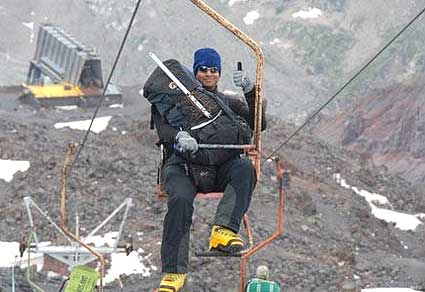 Alex going up on the chairlift. 