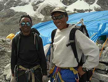 A Rita and Nima Tashi return from their "work-day" in the icefall