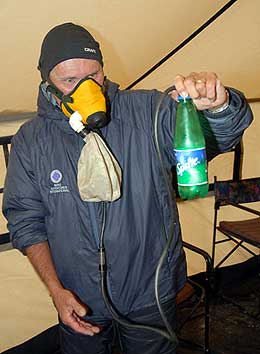 Wally demonstrates how to use the Poisk oxygen mask