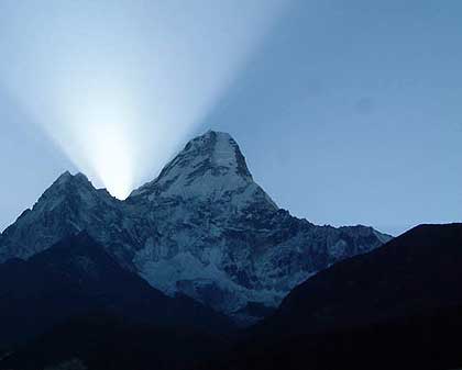 We watch the sun rise above Ama Dablam from the Sky Lounge