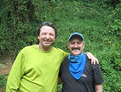 Rob and Darrell arm in arm on Kilimanjaro