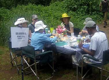 Team having lunch at the trailhead before they start the climb