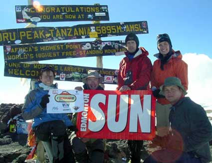 The entire team makes it to the summit of Kilimanjaro