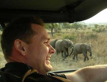 Rob is surprised when met up with 15 to 20 elephants coming in our direction along the river bank