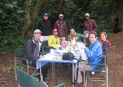 The team has a sit down lunch on Kilimanjaro