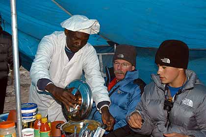 Enjoying a hot dinner after a long hike
