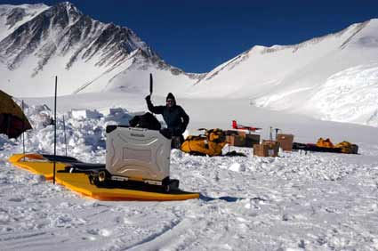 Martin works on cutting snow blocks at Vinson Base