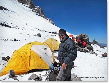 Osvaldo arrives at Nido de Condors camp to drop gear