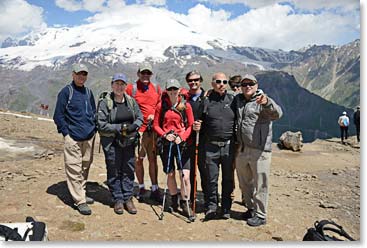 The 2014 Elbrus Expedition Team with their goal; Mount Elbrus towering behind them