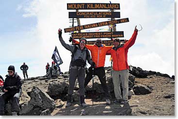 BAI climbers were some of the first to reach the summit and stand in front of the newly erected summit sign.