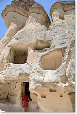 A building carved out of the rocks