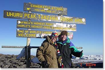 Cami on the summit of Kilimanjaro with her friend Brittany
