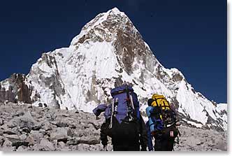 Climbers with heavy packs