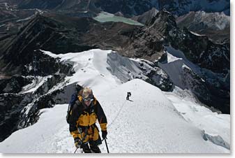 Climbing the snowy slopes of Lobuche