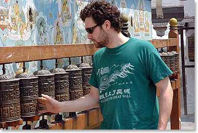 Thom spinning the prayer wheels at swyambunath