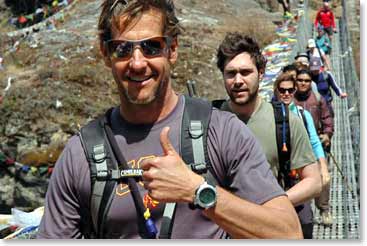 The team crossing the famous wire bridge