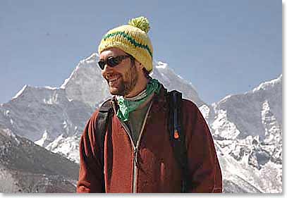 Thom with Himalayan mountain ridge in the background