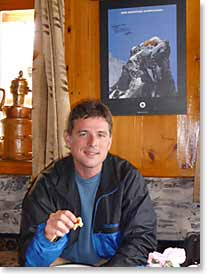 Deke breakfasts in a Sherpa lodge. Yes, that’s a Berg Adventures poster on the wall!