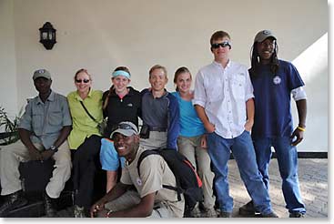 Holly, Phillip and some of the team take time for a group shot in the lobby of the Arusha Hotel