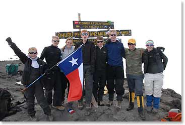 The Huffines children cheer and rejoice at the summit