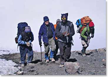 The guides keeping Larry moving towards the summit