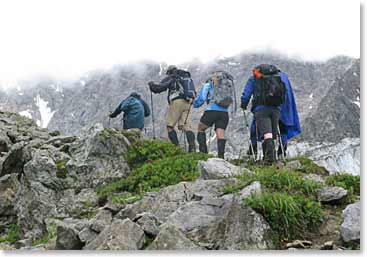 The team working their legs on a warm-up hike