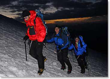 Team starts their climb in the dark
