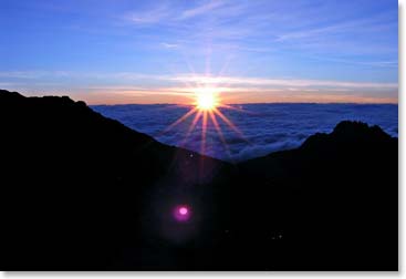 Sun rising near the top of Africa
