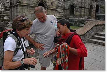 Sharon and George view the beautiful beadwork of a local woman