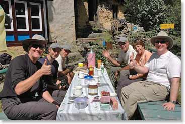 Everyone enjoys their breakfast in the morning sun