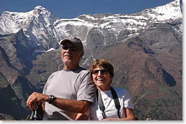 George and Sharon share a hug as they gaze at the gigantic peaks