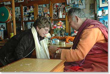 Sharon receives her blessings from spiritual teacher and guide, Lama Geshe